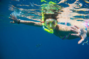girl engaged in snorkeling 
