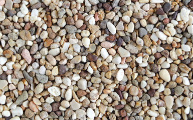 Gravels background, colorful sand close up