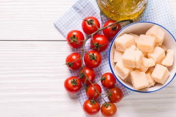 cheese , cherry tomatoes,oil and fresh parsley- ingredients for  salad