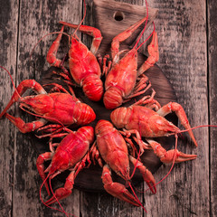 fresh boiled crawfish on the old wooden background