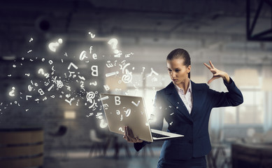 Woman with laptop in hands  . Mixed media