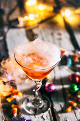 Halloween: Spooky Cocktail With Mist In Martini Glass