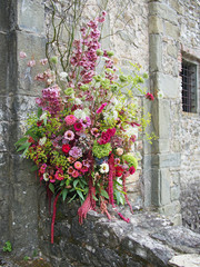 Fototapeta na wymiar Floral arrangement outdoors - pastel pink and green.