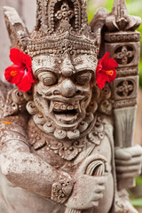 Ganesh Statue on green exotic leaves