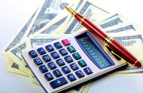 Image the money with calculator and financial tables  numbers