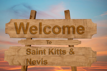 Welcome to Saint Kitts & Nevis sign on wood background