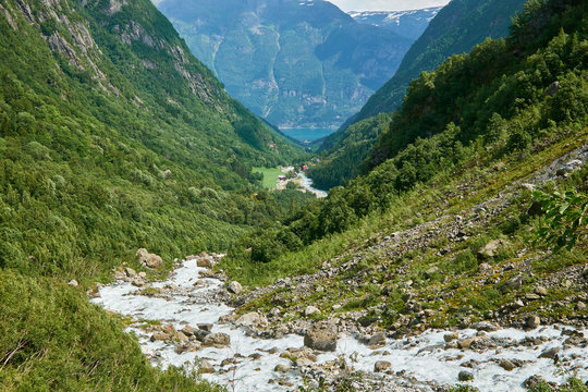 Looking down the valley to lake Sandvevatnet at Buer in Norway from the Folgefonna glacier