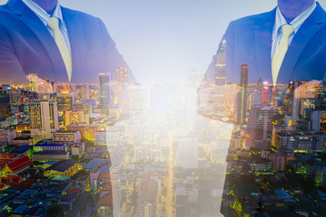 Double exposure of businessman and city background with copy space at the center for you text.