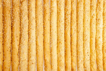 Excellent and natural breadsticks with sesame seeds with them cl