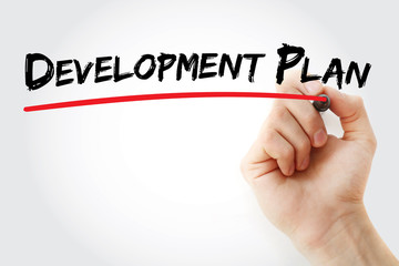 Hand writing Development plan with marker, concept background