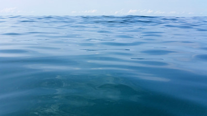 Surface of the warm sea with salt water