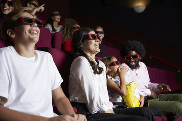 Naklejka premium Audience In Cinema Wearing 3D Glasses Watching Comedy Film