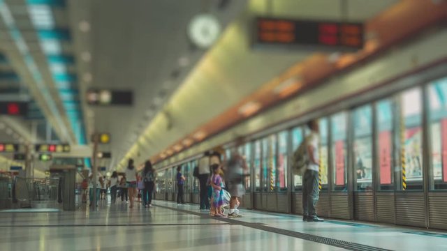 Unrecognizable People in Subway Station in Hong Kong Mtr