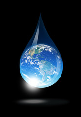 Obraz premium globe inside water drop on abstract background 