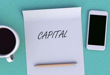 CAPITAL, message on paper, smart phone and coffee on table, 3D rendering