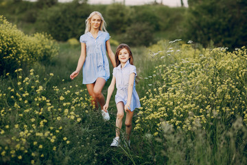 Obraz premium mom and daughter outside