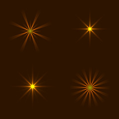 Set of Vector glowing light effect stars bursts. 
