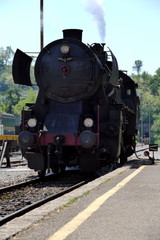 Fototapeta na wymiar Steam locomotive on station