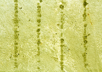 Grungy yellow cement wall texture.