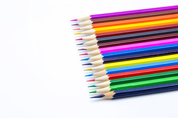 Line of color pencils.