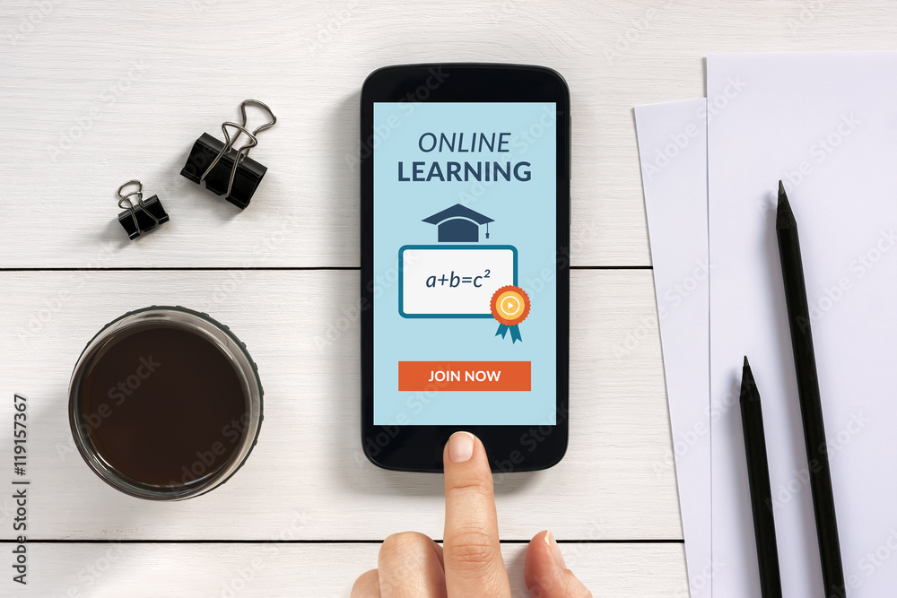 Wall mural online learning concept on smart phone screen with office objects. all screen content is designed by