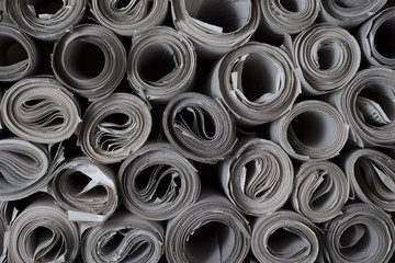 Paper twisted into rolls