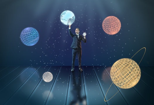 Businessman touching 3d planets of the Solar System, surrounded by stars