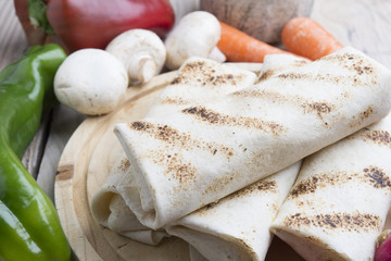 tortilla wraps with meat and vegetables