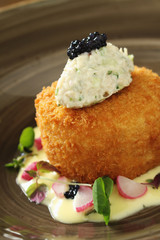 gourmet fishcake plated meal