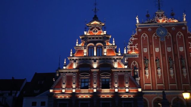 Panoramic video shot of House of the Blackheads in the old town of Riga, Latvia in the night

