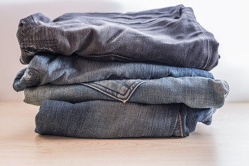 Stack of old jeans