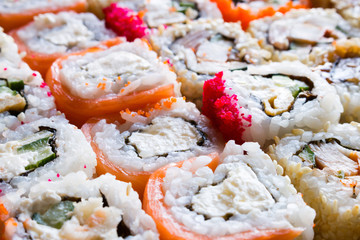 background of sushi rolls closeup
