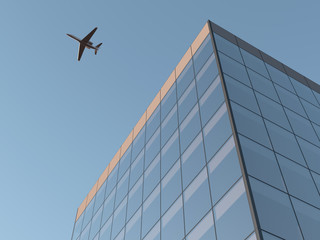 Obraz premium Airplane over office building