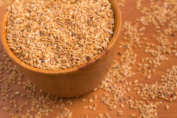 Gold linseed into a bowl