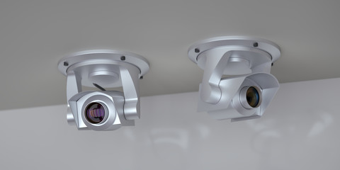 Two security cameras on the ceiling