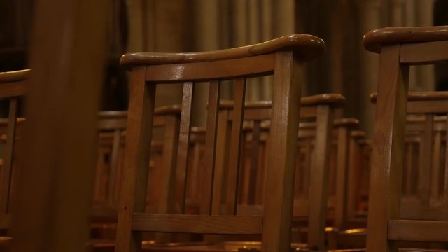 Lot of empty chairs in a row Christian religious building 4K 2160p 30fps UltraHD footage - Seats in the church religion background 4K 3840X2160 UHD video 