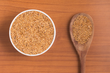 Gold linseed into a bowl
