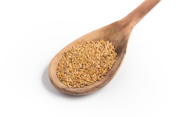 Gold linseed into a spoon