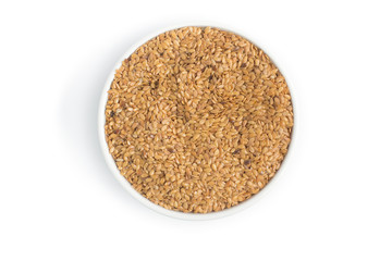 Gold linseed into a bowl