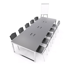 Empty conference table with flip chart