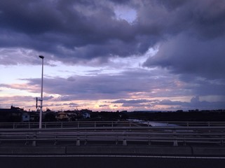 sunset sky and tama river on the bridge