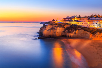 A panorama of Carvoeiro at the dusk in Algarve region, Portugal, Europe