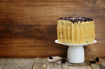 Pumpkin and chocolate layer cake with salted caramel cream chees