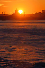 Sunset on the Neva river at the Admiralty embankment