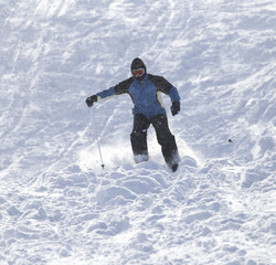 Fototapeta na wymiar people skiing in the snow