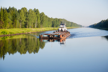 River cargo ship goes from Moscow Canal
