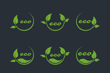 eco or bio friendly company logo, green leaves on black background