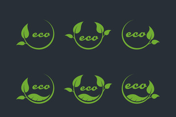 eco or bio friendly company logo, green leaves on black background