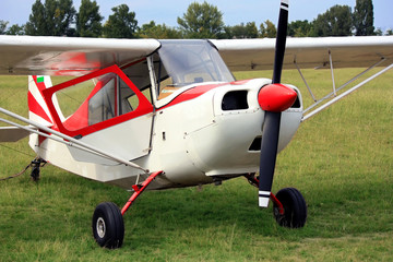Red glider towing plane