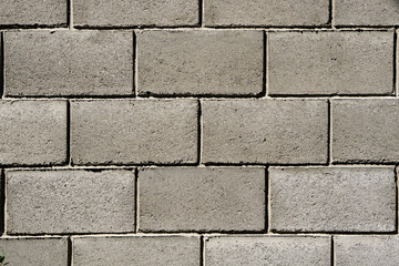 Fototapeta premium Texture of grey cream brick wall